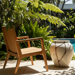 A repaired wooden chair and ceramic pot sitting in the bright Australian sun, demonstrating the strength and durability of Glues Australia's UV stable adhesive for outdoor repairs