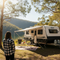 Lifestyle image showing Glues Australia product with a caravan in a sunny outdoor setting, perfect for all your RV and mobile home repairs and maintenance