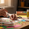 image showing a person's hands using Glues Australia's 'Syringe' adhesive on a colorful DIY crafting project