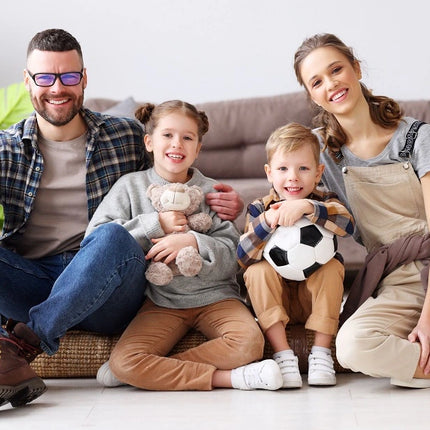 Family relaxing on a floor warmed by a Hotwire heating mat