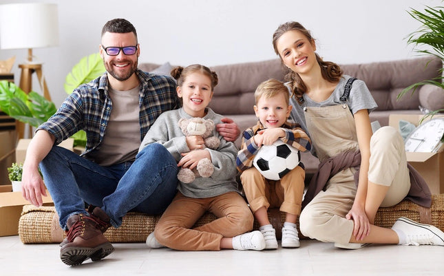 Family relaxing on a floor warmed by a Hotwire heating mat